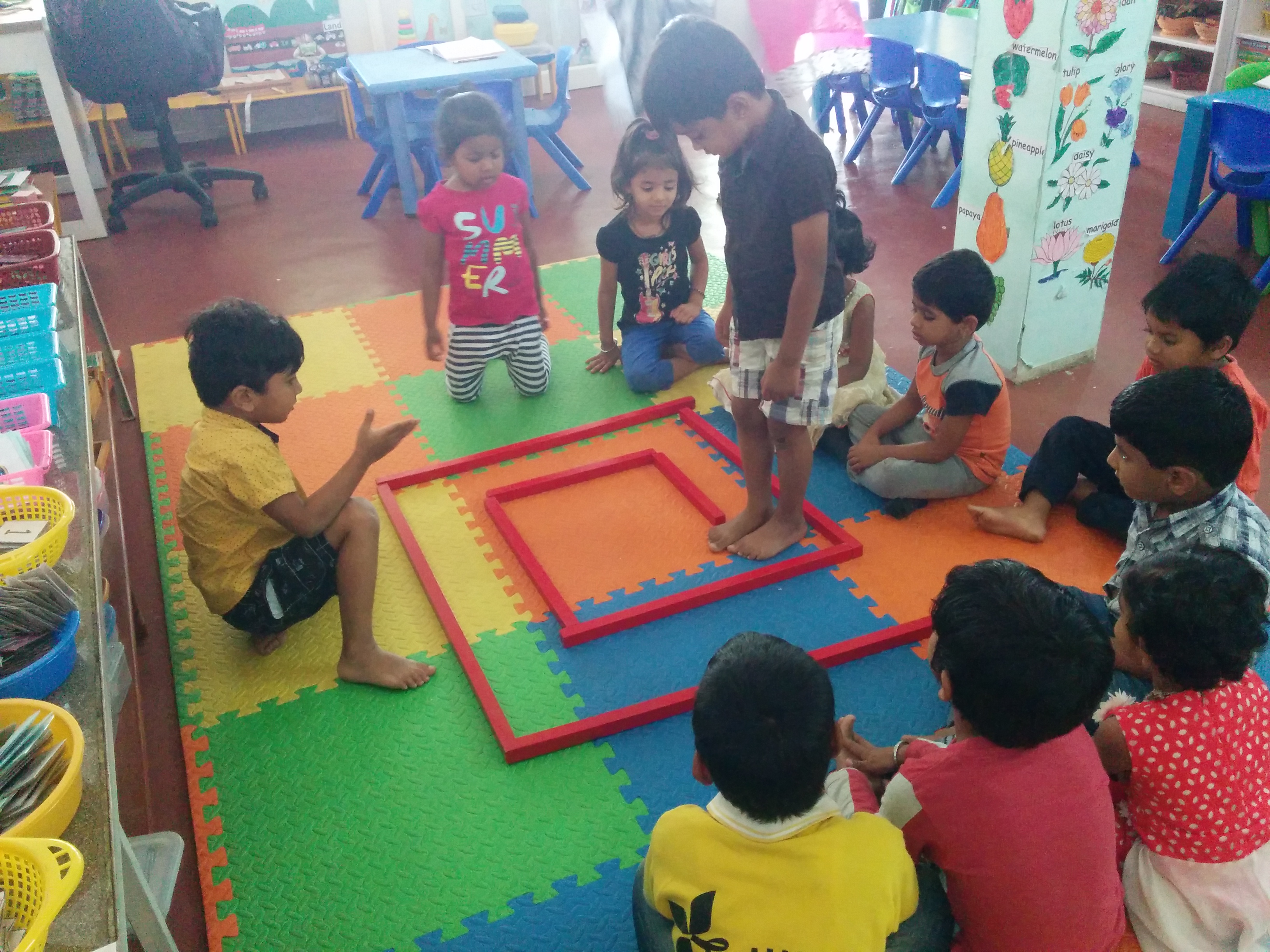 Child playing Red Rod Maze