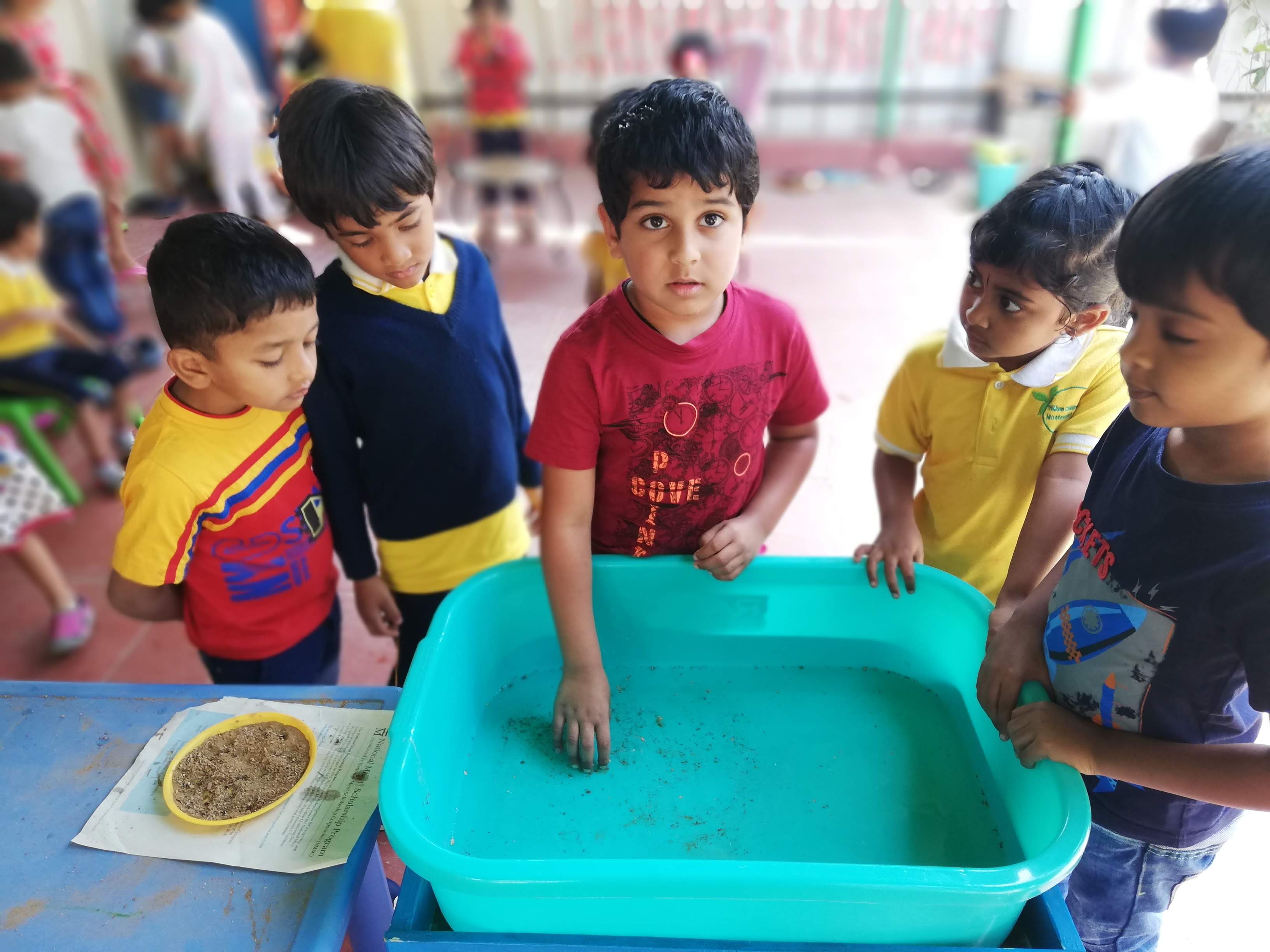 Child learning about soil and water